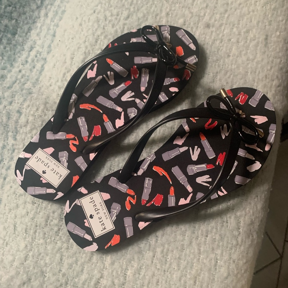 Kate Spade flip flops.  Worn once.  Like new.
